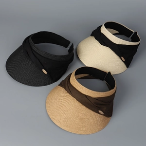 Detailed weave of three sun hats with ribbon trim and metallic logo buckle