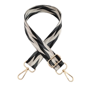 Adjustable wide replacement shoulder strap with black and white chevron weave and gold hardware