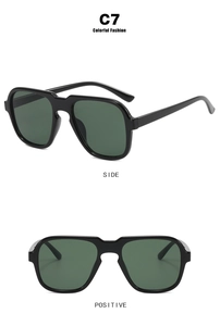 Detailed front and side views of black oversized pilot sunglasses with green lenses