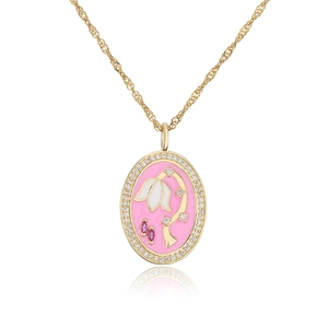 Gold necklace with pink enamel oval pendant featuring white flower and micro-inlaid crystals