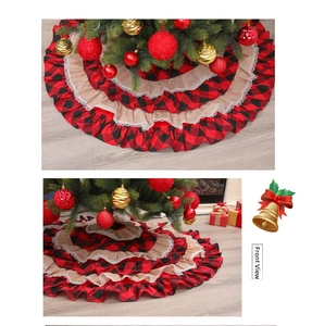 Detail view of red and black buffalo plaid Christmas tree skirt with ruffled lace edges