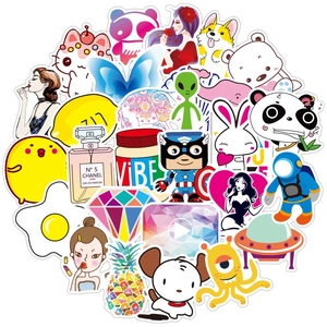 Macro shot of colorful VSCO graffiti stickers featuring varied cartoon patterns and icons