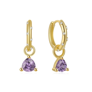 Detail of gold hoop earrings with sparkling micro diamonds and purple triangle zircon drops