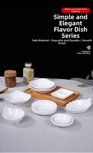 Macro view of white melamine dipping dishes in various geometric shapes on a wooden tray