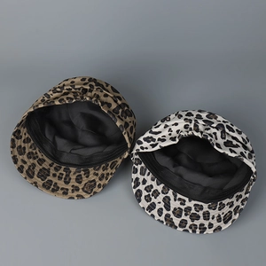 Leopard print newsboy caps in brown and white patterns with high-quality inner lining