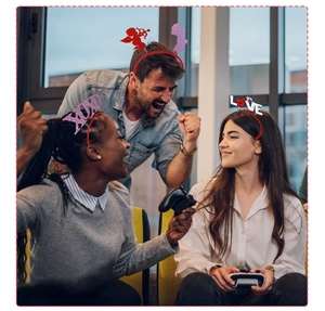 Lifestyle shot of festive glitter LOVE and XOXO headbands worn at a lively party event
