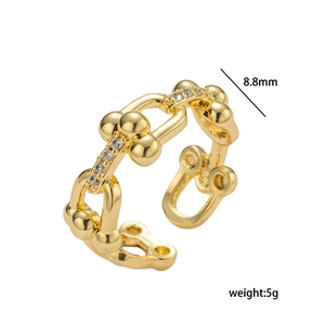 U-shaped horseshoe gold open ring with sparkling cubic zirconia and bead details