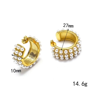Detail view of gold hoop earrings with small pearls, 27mm diameter and 10mm width