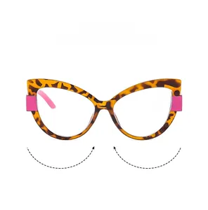 Detailed view of cat-eye TR90 frames with leopard print pattern and pink color block accents