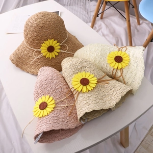 Handmade crochet straw hats with sunflower decor in four assorted natural colors