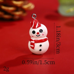 Detail view of resin snowman pendant with dimensions 1.18in height and 2g weight
