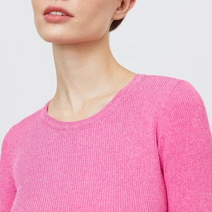 Detail view of the rose pink ribbed knit crew neck top showing the high quality texture