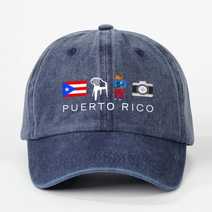 Detailed embroidery of Puerto Rico frog design on washed blue denim baseball cap