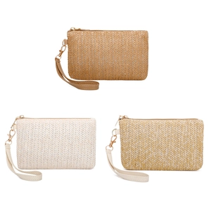 Straw woven clutch bags in brown and beige colors with textured patterns