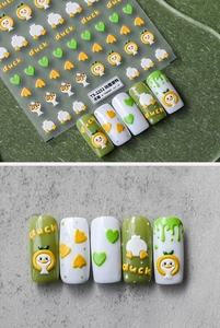 Detailed 3D relief nail art sticker featuring cute yellow duck and heart designs