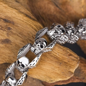 Macro view of vintage silver skull links on a hip hop stainless steel bracelet