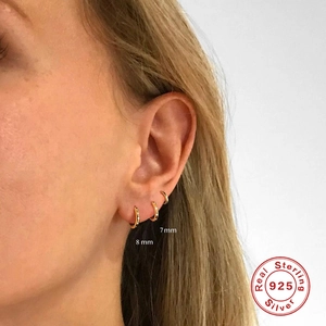 Three-piece set of 925 sterling silver gold huggie earrings in 7mm and 8mm sizes