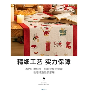 Detailed Christmas table runner with festive reindeer, Santa motifs, and premium red borders