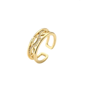 Detailed close-up of hollow gold-plated ring featuring zircon heart and adjustable band