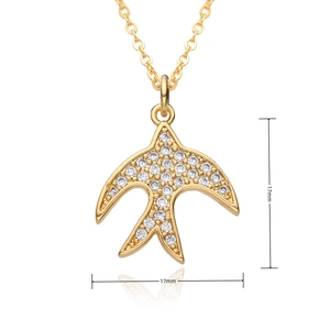 Macro detail of gold swallow pendant with white cubic zirconia stones and 17mm size mark