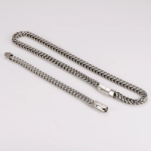 Detailed view of 8mm silver stainless steel chain with a durable woven link and clasp
