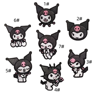 Detail view of seven Sanrio Kuromi high-density embroidery patches in diverse poses