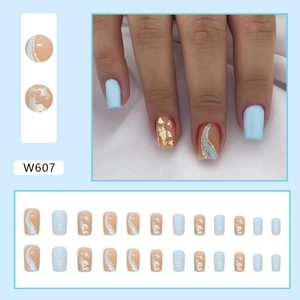 Blue and orange square press-on nails set with gold foil accents and 24 pieces in a box