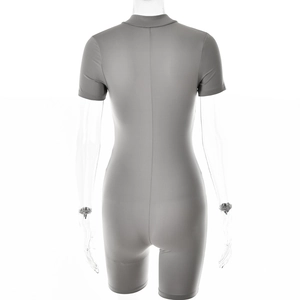 Detail view of a gray short-sleeved ribbed bodysuit on a professional mannequin