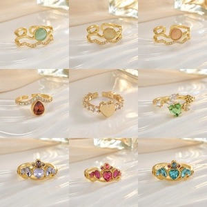 Set of 9 gold-plated adjustable rings with colorful crystal gemstones and crown designs