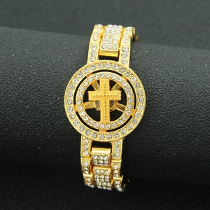 Hip hop style gold bracelet with iced out cross design and white crystal stones