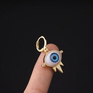 Golden Evil Eye earring with blue enamel iris and cubic zirconia on round hoop