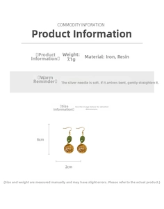 Detail view of retro green resin hollow sphere earrings with 6cm length dimensions