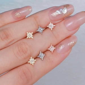 Star-shaped stainless steel stud earrings set with cubic zirconia in gold silver rose gold