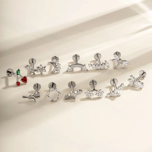 G23 titanium cherry labret stud earrings set with crystal flower and moon designs