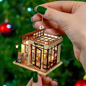 Bookstore design acrylic Christmas tree hanging ornament with a gold festive string