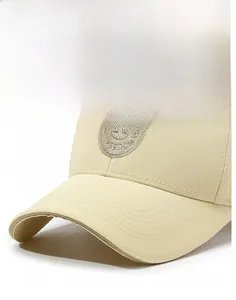 Detailed close-up of sturdy baseball cap brim with high-density stitching and shield embroidery