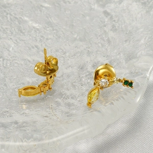 Fashionable gold banana stud earrings with yellow marquise zircon and green stones