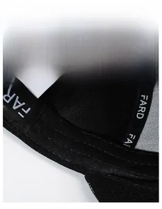Detailed macro view of the wide sweatband design in a black baseball cap for moisture wicking