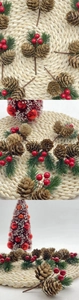 Detail of Christmas picks with pine cones, red berries and green pine needles for DIY crafts