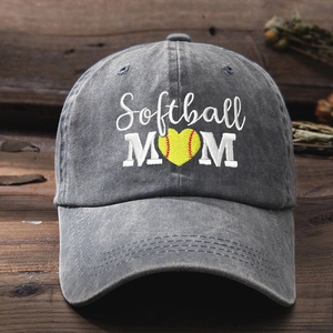 Faded grey washed cotton baseball cap with Softball MOM embroidery on wood surface