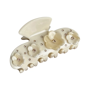 Beige acetate flower hair claw clip with sparkling rhinestones for elegant styling