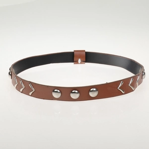 Detailed view of brown leather strap featuring silver round studs and metallic arrow accents