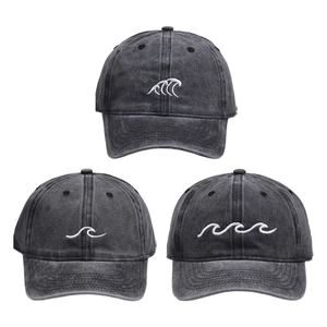 Three washed charcoal grey baseball caps with unique white wave embroidery patterns