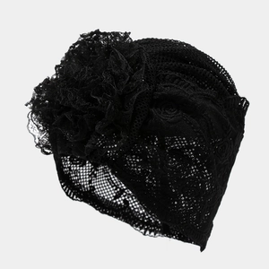 Breathable black lace beanie with floral pattern and large flower detail on white background