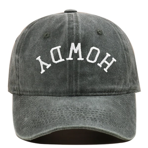 Detailed close-up of HOWDY embroidery on washed cotton retro vintage baseball cap