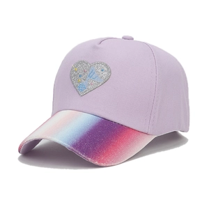 Detail of kids baseball cap with silver glitter heart and rainbow mermaid tail design