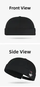 Detail view showing the black cotton fabric and equestrian woven label on the Miki hat