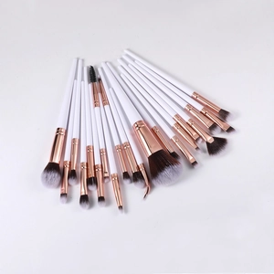20pcs professional makeup brush set in rose gold and white, fanned out on white background