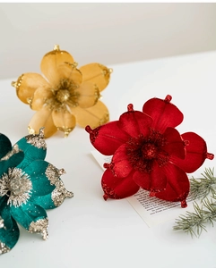 Three 20cm velvet artificial Christmas flowers with glitter petals in gold green and red