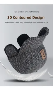 Detailed view of grey herringbone winter hat featuring 3D cut and warm ear flaps